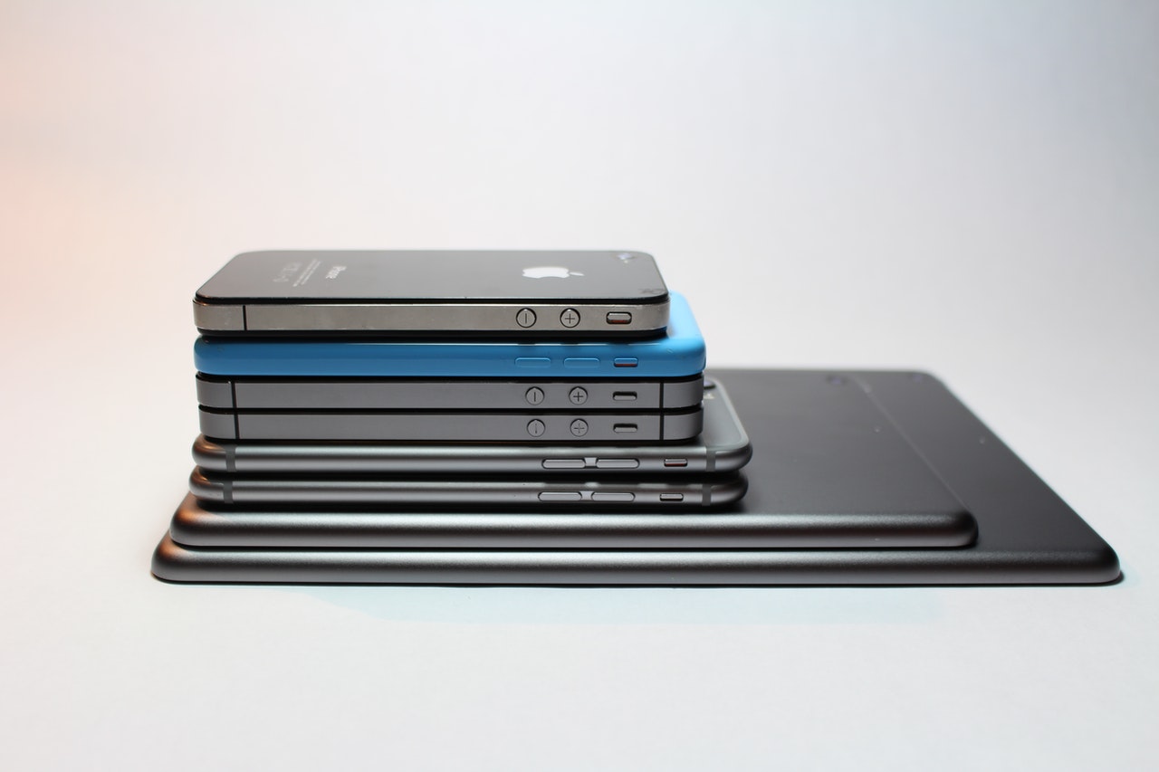 A stack of Apple devices